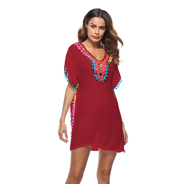 Beach dress adorned with bright pom poms for women Lune London