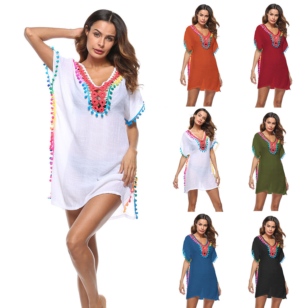 Beach dress adorned with bright pom poms for women Lune London