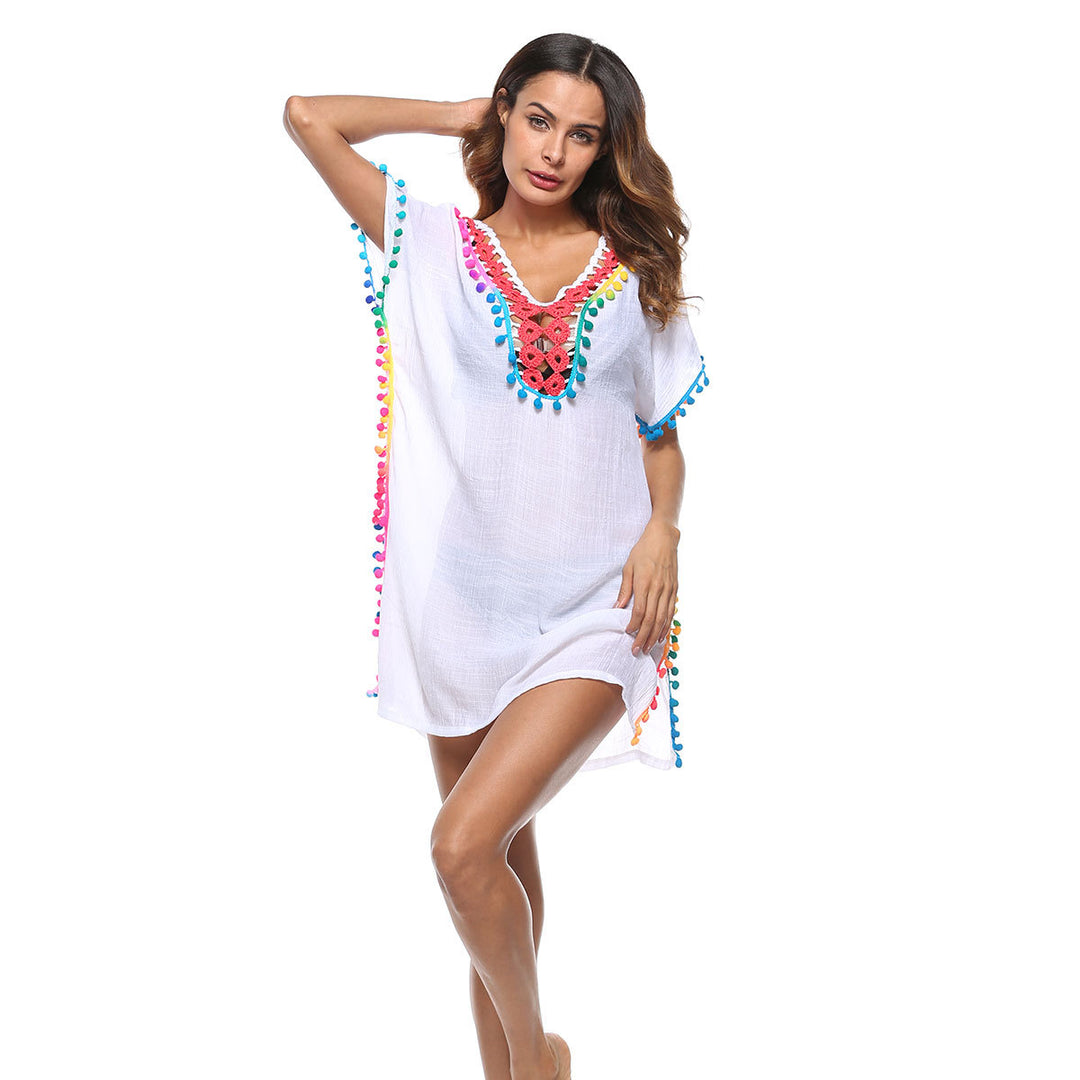 Beach dress adorned with bright pom poms for women Lune London