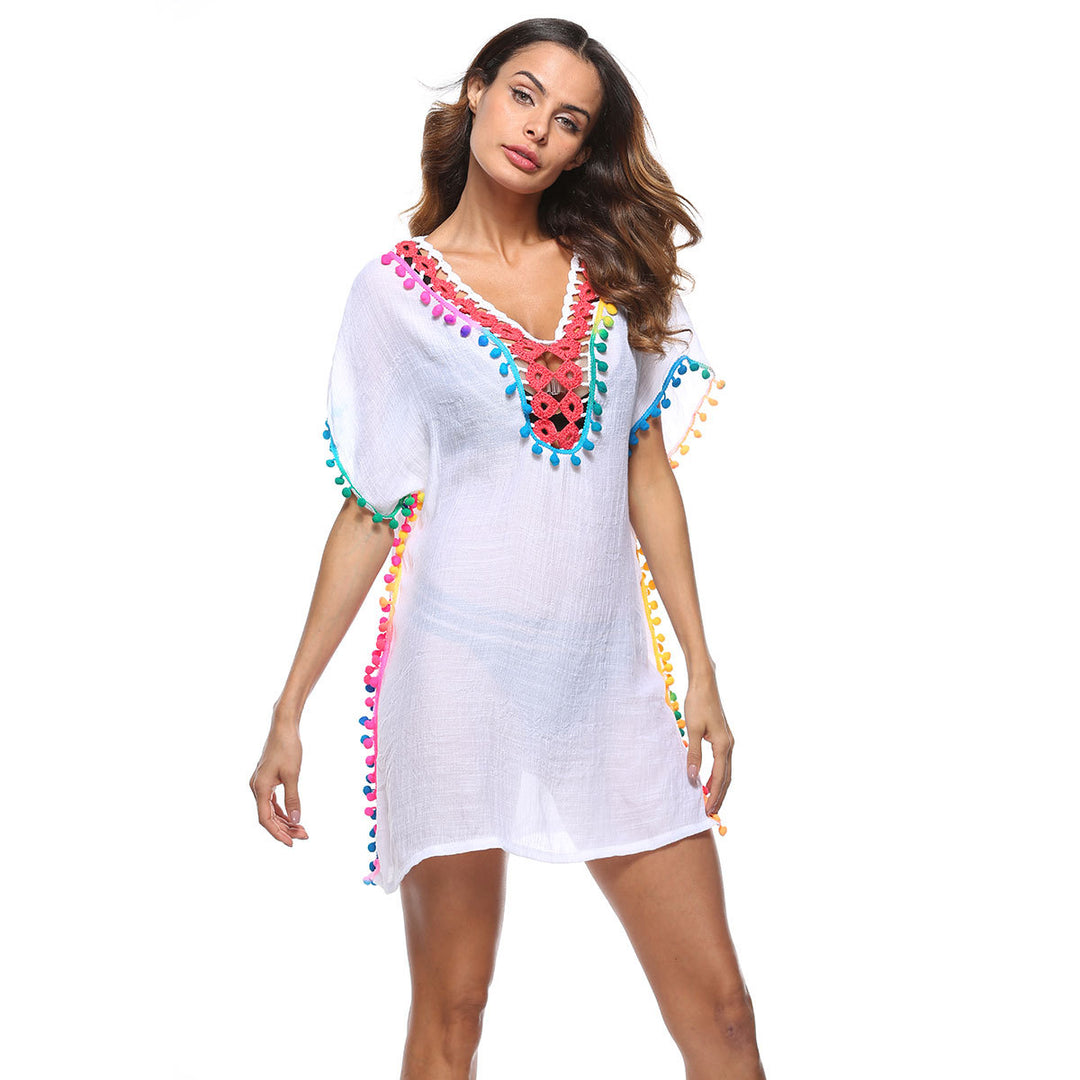 Beach dress adorned with bright pom poms for women Lune London