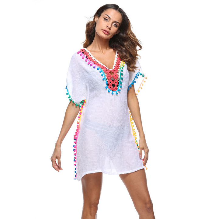 Beach dress adorned with bright pom poms for women Lune London
