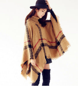 Knit poncho for women with high collar and trendy fringe design Lune London