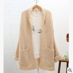 Women thick knit open sleeve cardigan with practical pockets Lune London