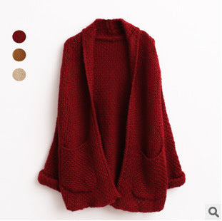 Women thick knit open sleeve cardigan with practical pockets Lune London