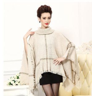 Knit poncho for women with high collar and trendy fringe design Lune London
