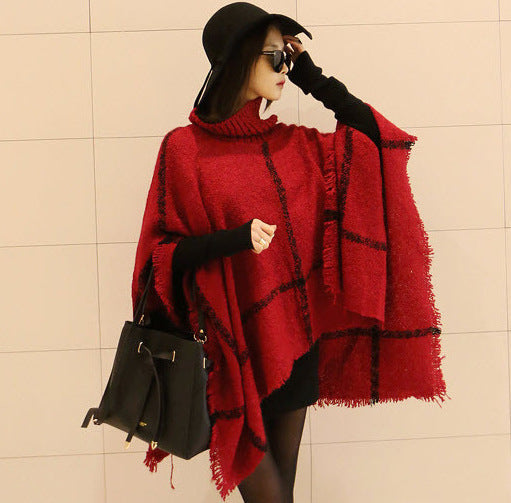 Knit poncho for women with high collar and trendy fringe design Lune London