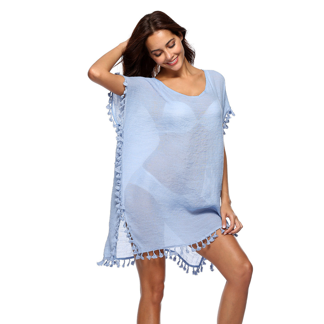 Ladies poncho with fringe trim Lune London