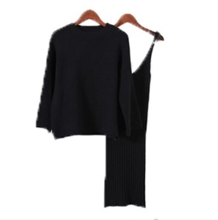 Women’s fashionable knitted set with a comfortable oversized sweater and a chic fitted dress.