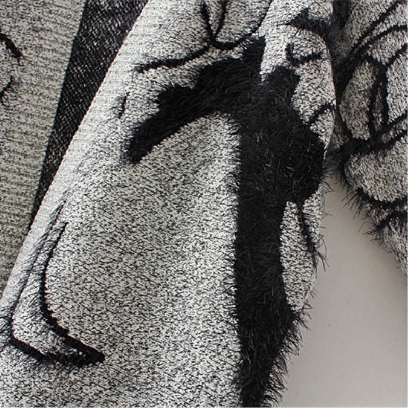 Women's knit dress with artistic graphic design and an elegant V-neck Chic and Style