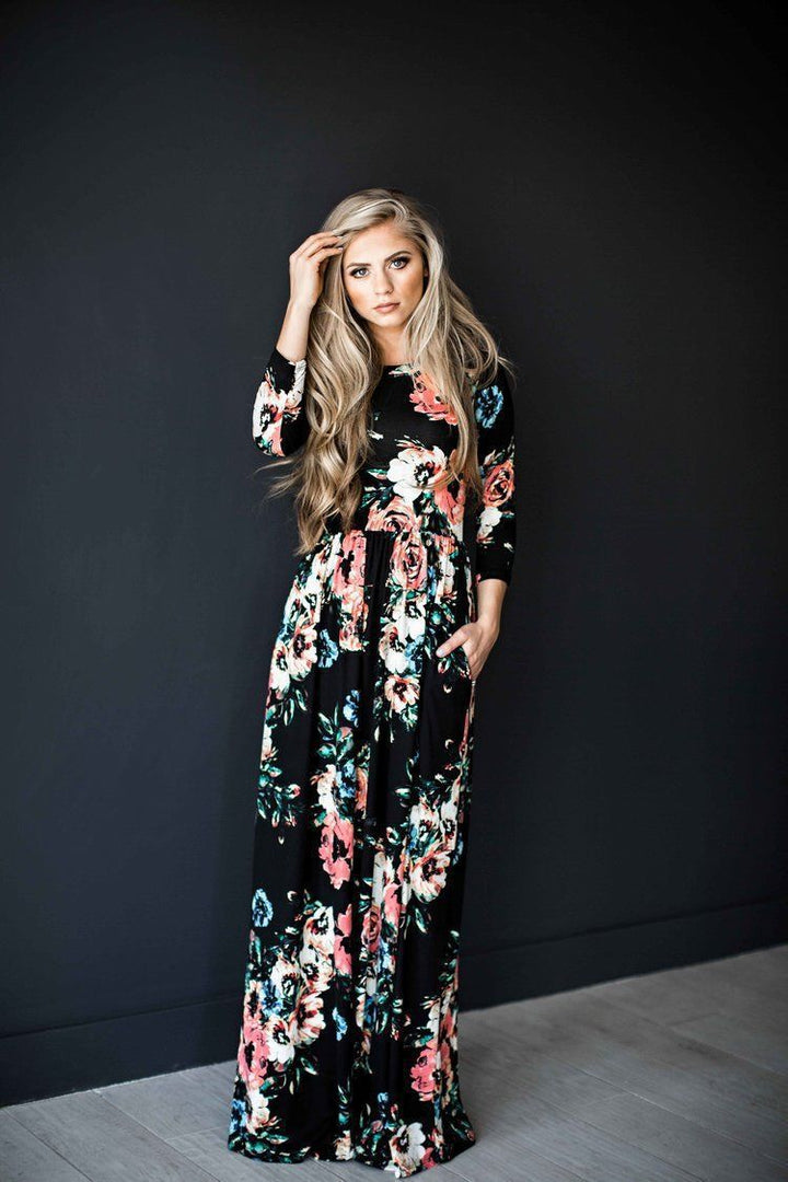 Robe maxi femme avec des motifs floraux et une jupe longue et fluide Chic & Stil