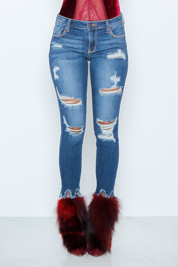 Jeans skinny pour femmes dans un style détruit à la mode avec des ourlets effilochés Lune London