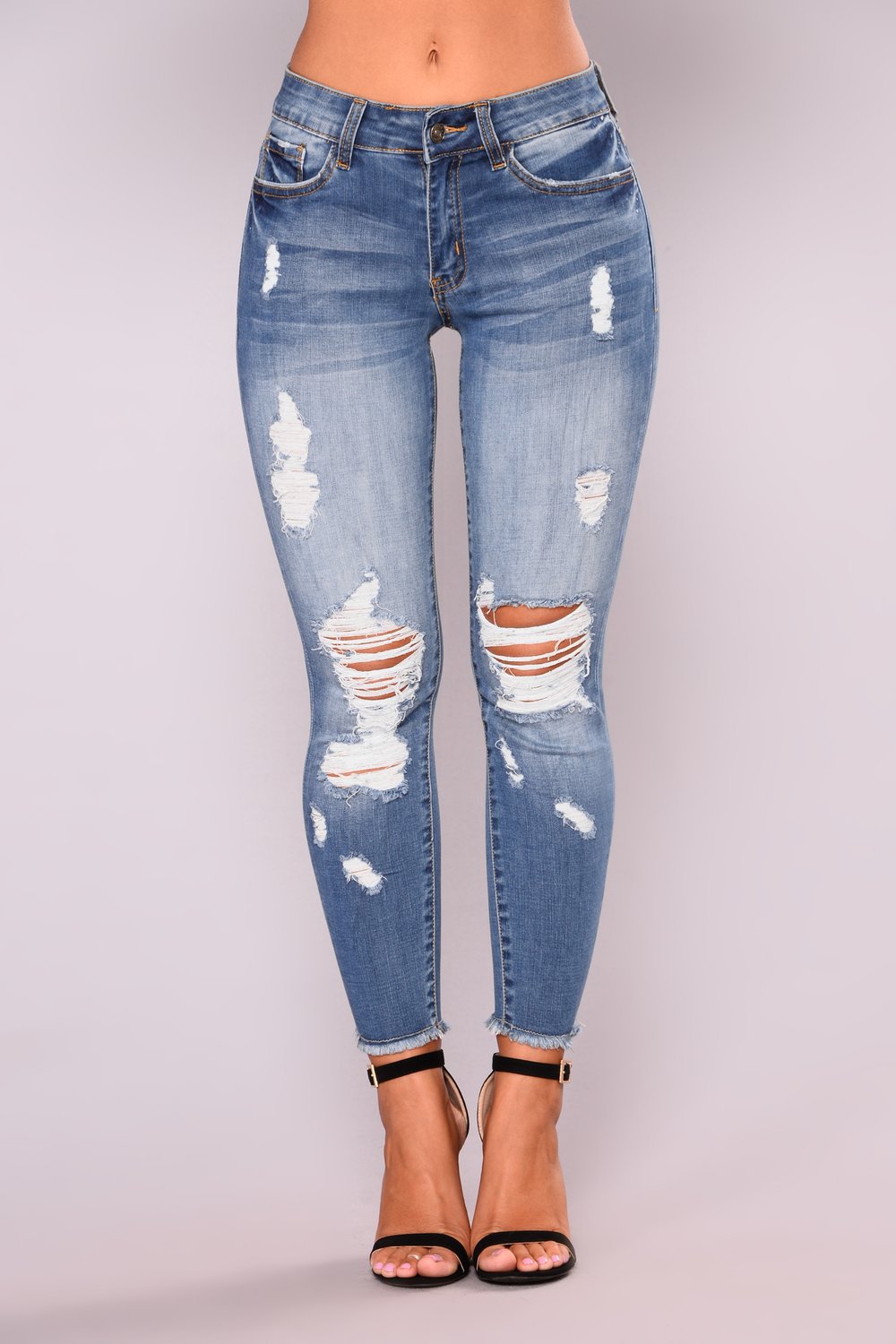 Jeans skinny pour femmes en look usé avec des déchirures marquées Lune London