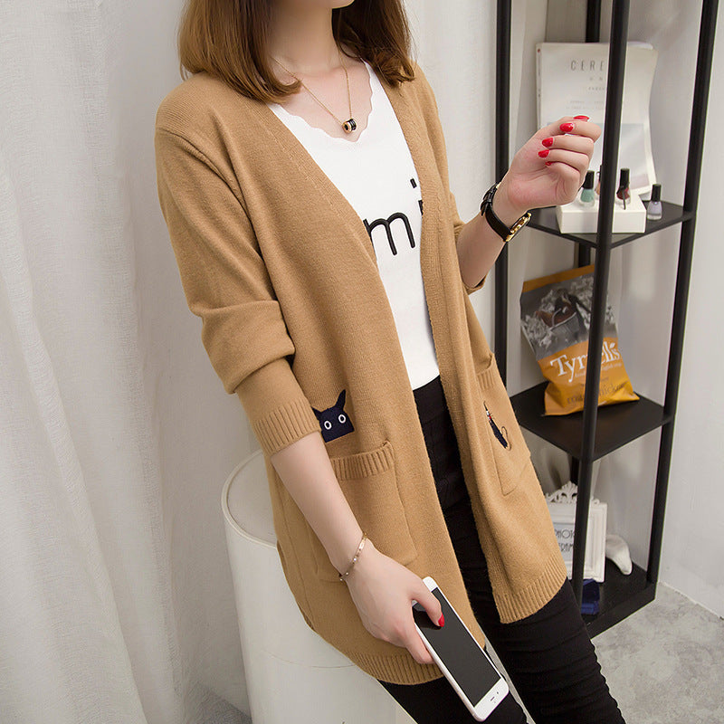 Cardigan pour femmes avec un motif de chat ludique et poches profondes Chic & Stil