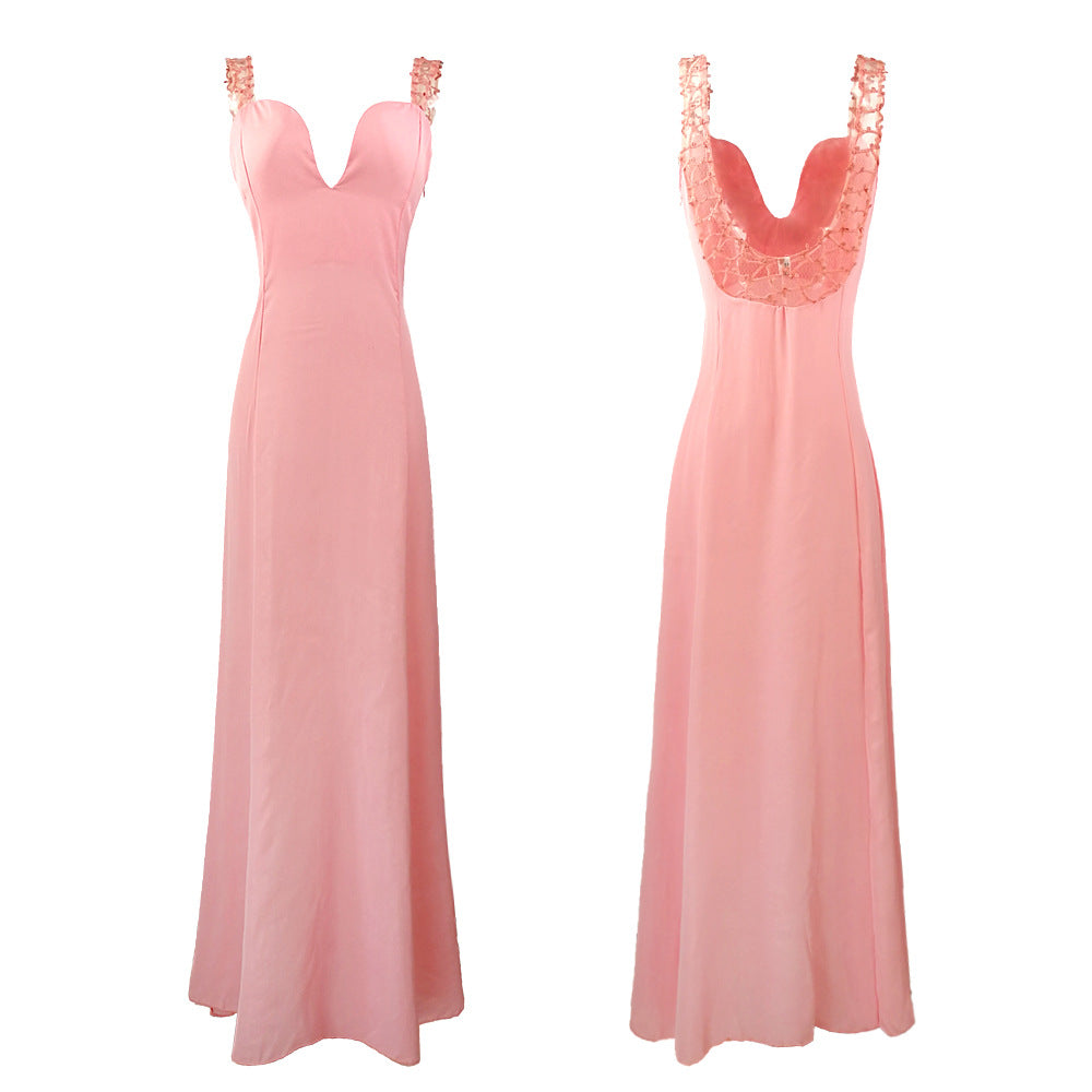 Ladies elegant evening dress with deep V-neck and shimmering details