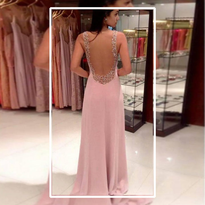 Ladies elegant evening dress with deep V-neck and shimmering details