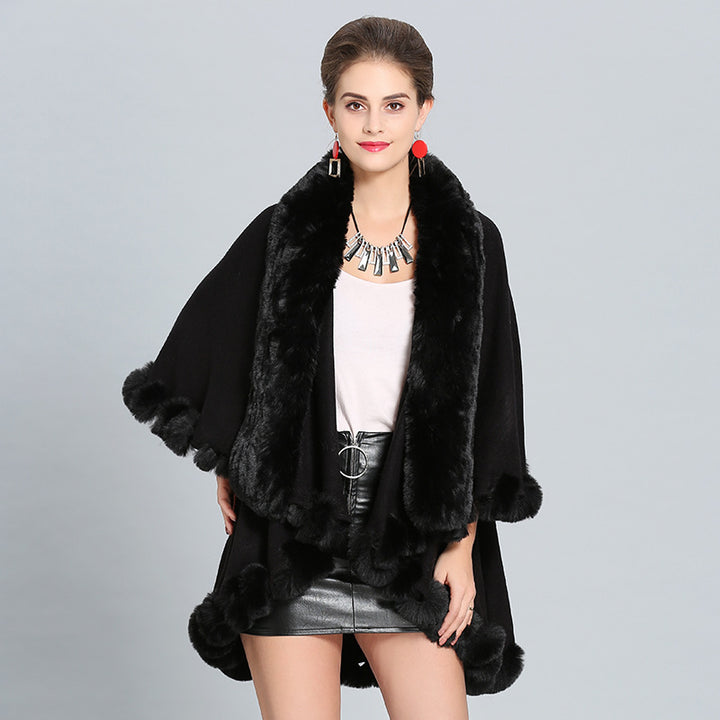 Ladies hooded poncho with luxurious fur collar and elegant trim Lune London
