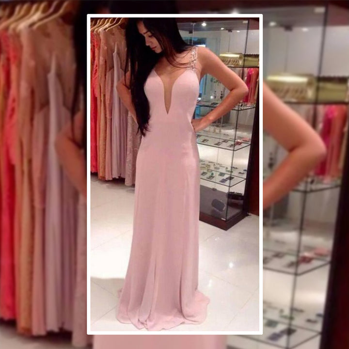 Ladies elegant evening dress with deep V-neck and shimmering details