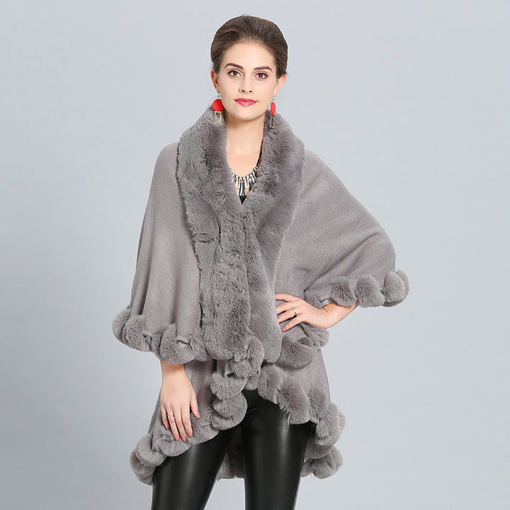 Ladies hooded poncho with luxurious fur collar and elegant trim Lune London