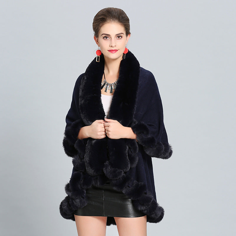 Ladies hooded poncho with luxurious fur collar and elegant trim Lune London