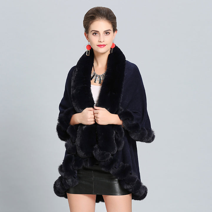 Ladies hooded poncho with luxurious fur collar and elegant trim Lune London