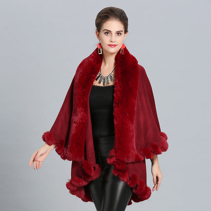 Ladies hooded poncho with luxurious fur collar and elegant trim Lune London