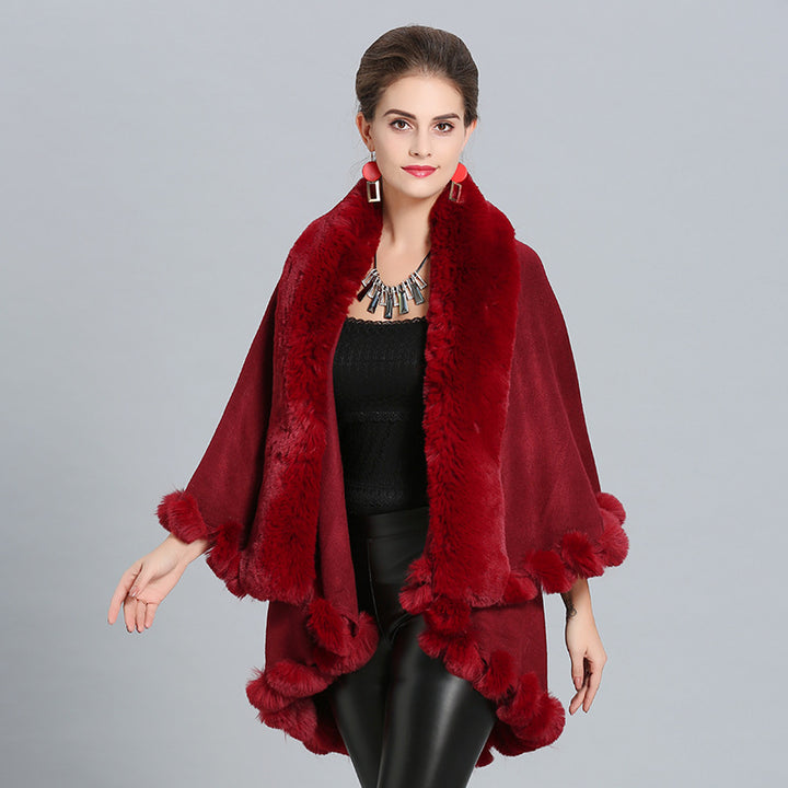 Ladies hooded poncho with luxurious fur collar and elegant trim Lune London
