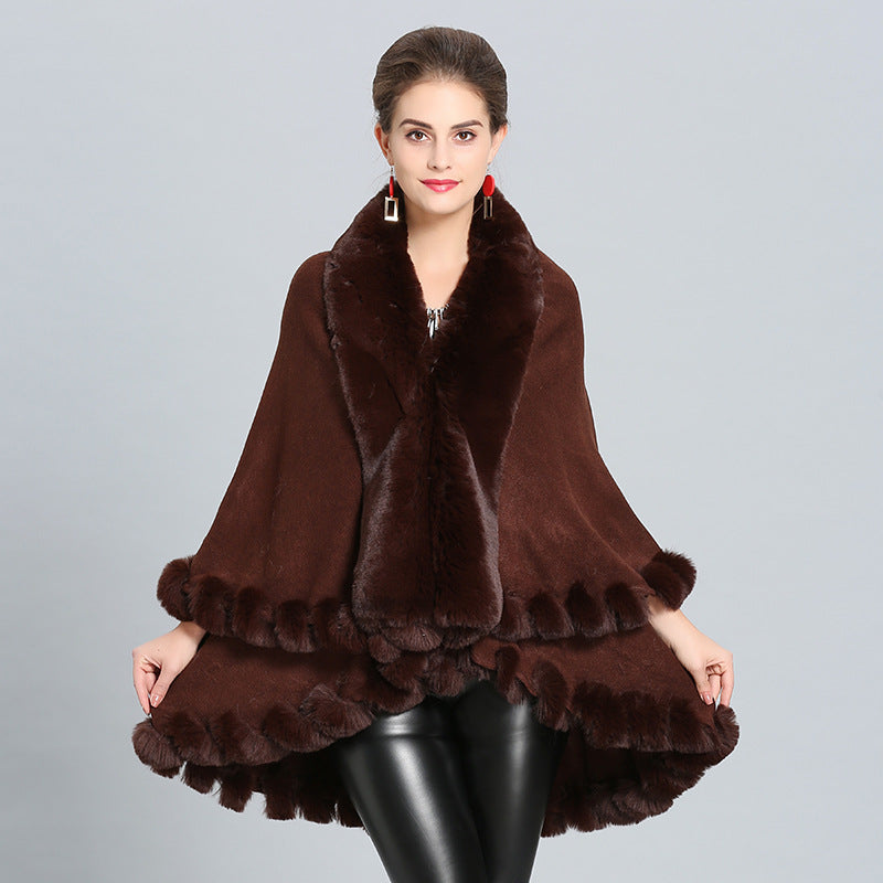 Ladies hooded poncho with luxurious fur collar and elegant trim Lune London