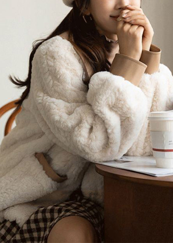 Lune London | Winter coats with white Peter Pan collar and faux fur buttons