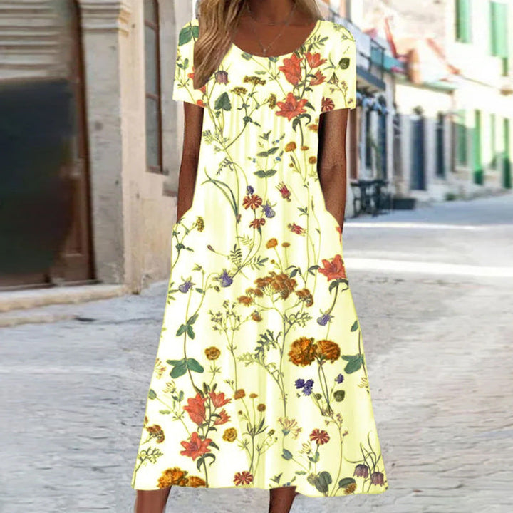 Lune London | Maxi dress in Bohemian style with floral pattern and pockets Short-sleeved maxi dress with floral pattern in Boho chic style for women