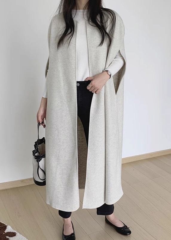 Lune London | Black wool coats with O neckline and relaxed sleeves