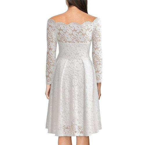 Lune London | Lace dress with a slit at the neckline and sleeves