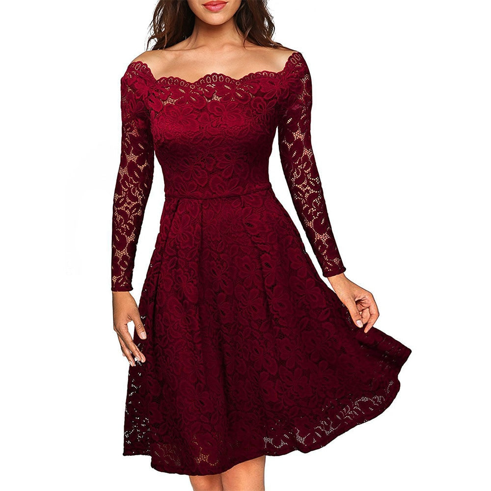 Lune London | Lace dress with a slit at the neckline and sleeves