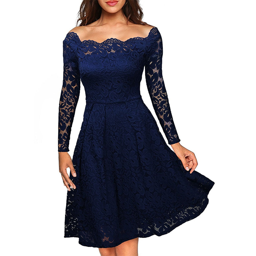 Lune London | Lace dress with a slit at the neckline and sleeves