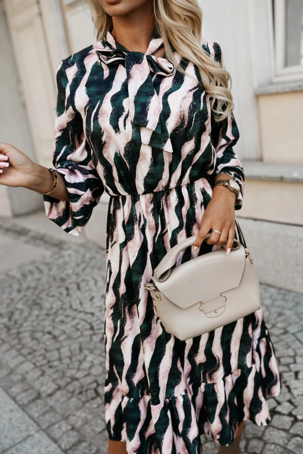 Maxi dress for ladies with an elegant striped pattern and practical pockets Lune London