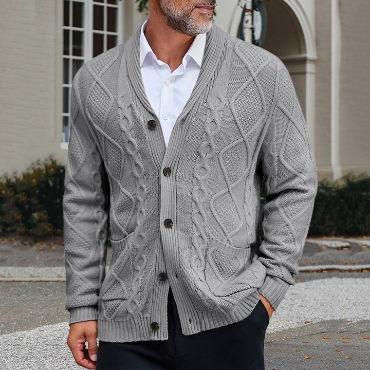 Men's chunky knit jacket with an elegant cable pattern and practical pockets Lune London