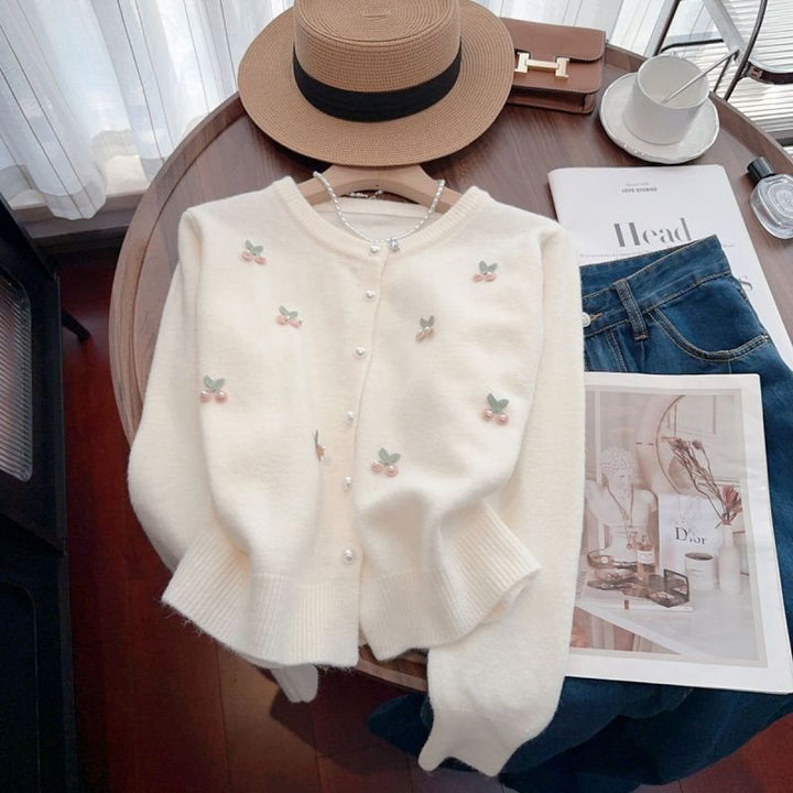 Knitted women’s jacket with floral design and pearl button details Lune London