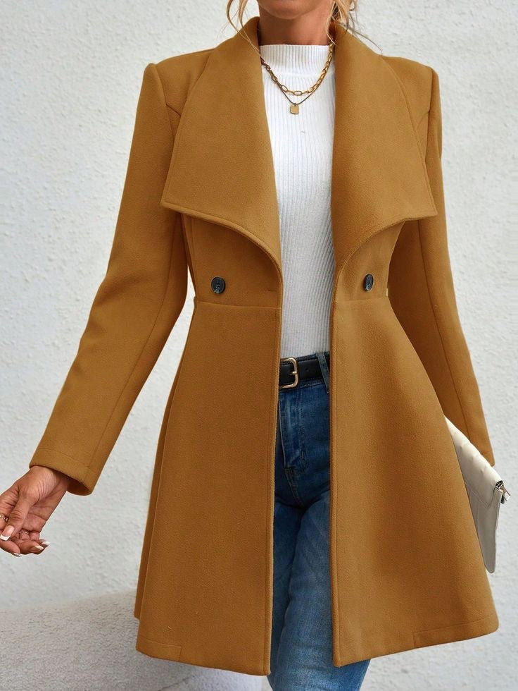Ladies elegant wool coat with a loose and cinched silhouette and modern button details Lune London