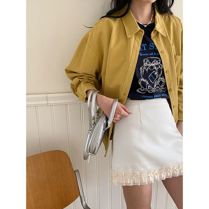 Women's denim shirt jacket with two breast pockets and button closure Chic & Stil