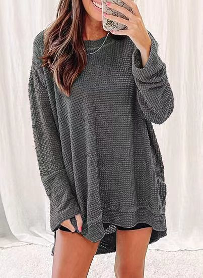 Waffle knit long sleeve sweater for women with open cut and side slits Lune London