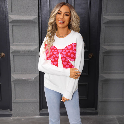Knitted sweater for women with playful heart pattern Lune London