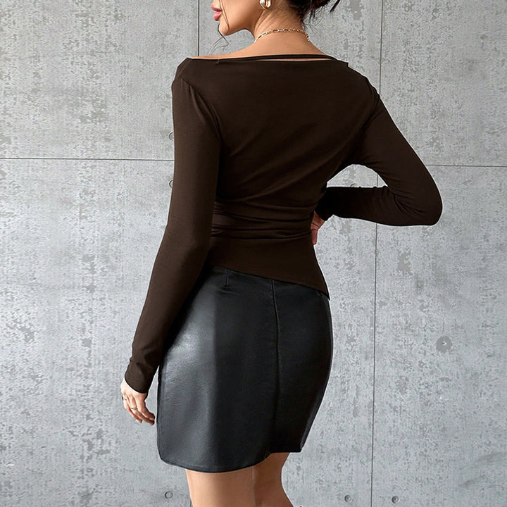 Haut à manches longues pour femmes avec une coupe asymétrique sophistiquée et un design d'épaule unique Chic & Stil