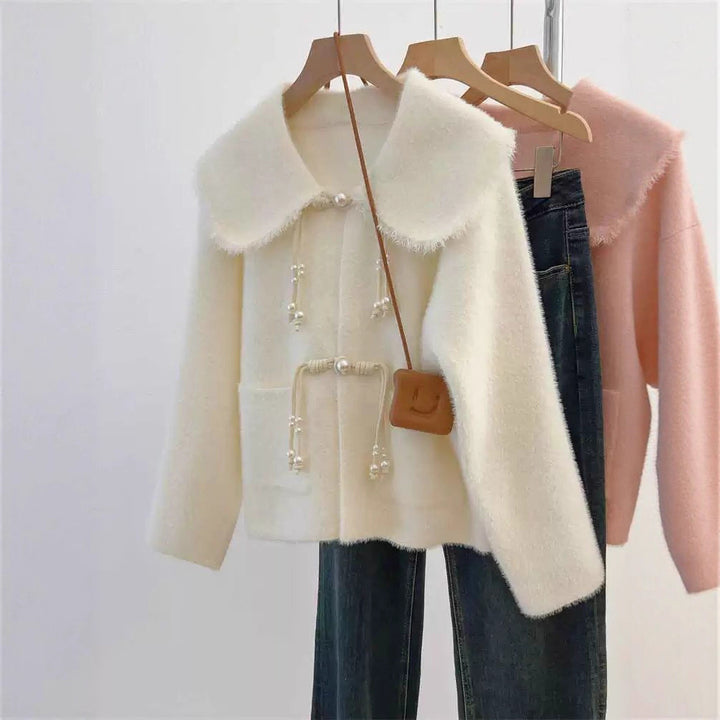 Cardigan féminin élégant avec détails en perles Chic & Stil