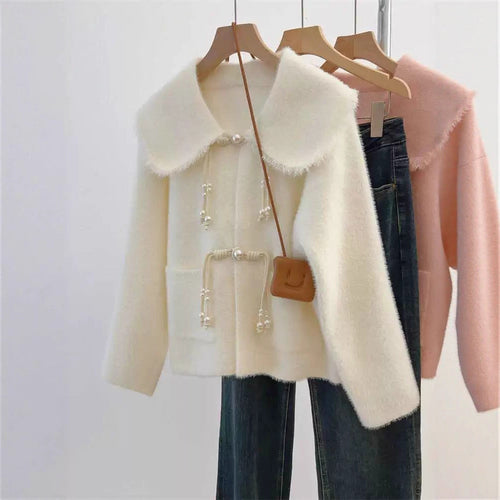 Cardigan féminin élégant avec détails en perles Chic & Stil