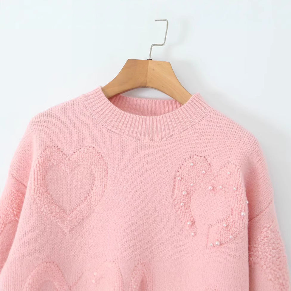 Pull en tricot confortable pour femmes avec motifs en cœur Chic & Stil
