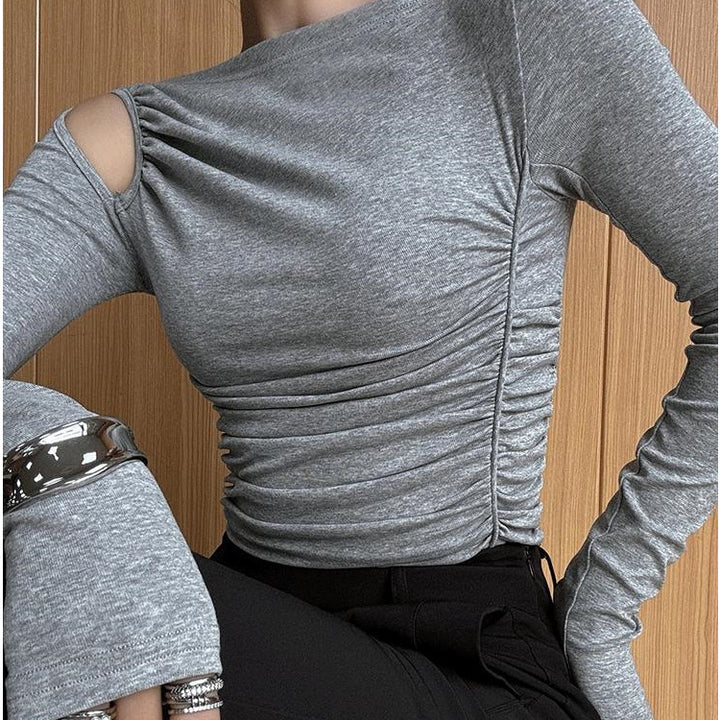 Women's asymmetrical long sleeve shirt with gathering on the side