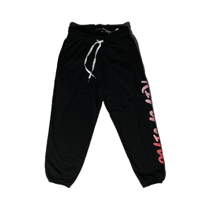 Women's loose sport jogging pants with elastic waistband and modern lettering Chic & Stil