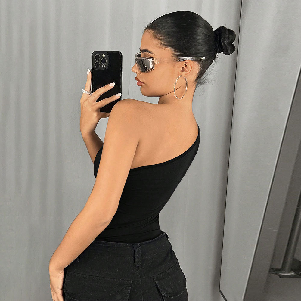 Asymmetrical swimsuit for women with trendy cut-out design Chic & Stil
