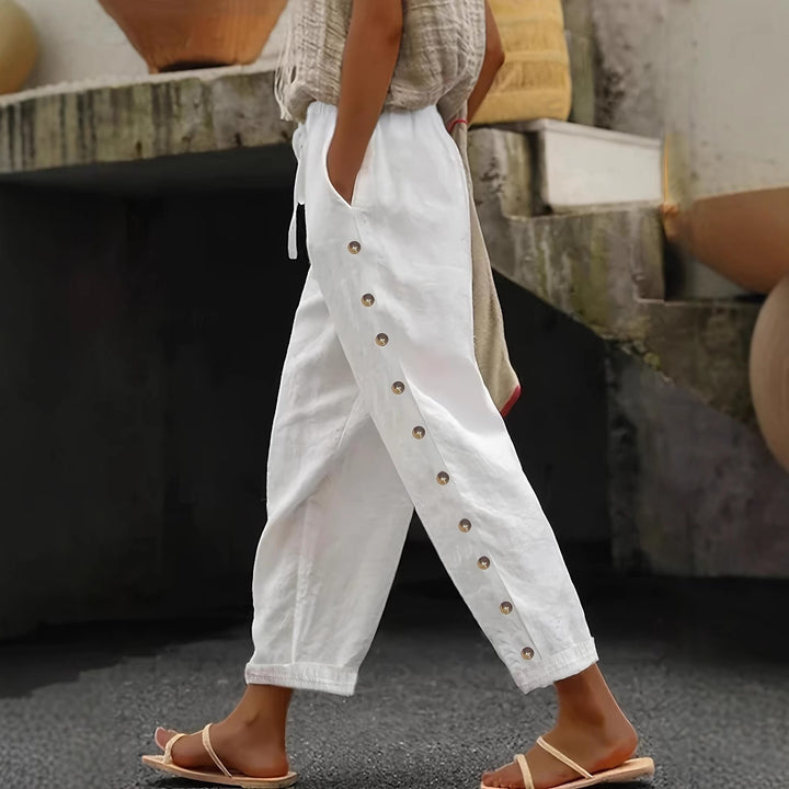Wide trousers for women with button details on the sides and elastic waist Lune London