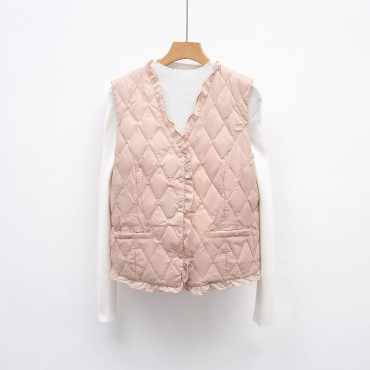 Ladies quilted vest with asymmetrical cut Lune London