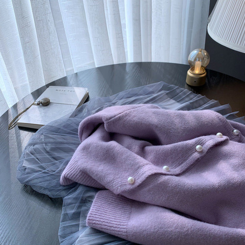 Cardigan femme avec élégants boutons en perles et design moderne Chic & Stil